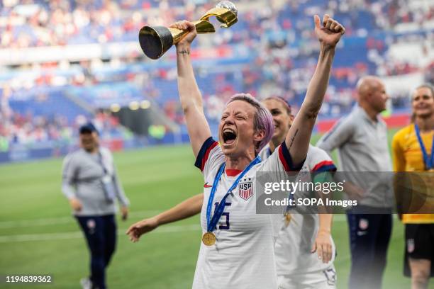 Megan Rapinoe of the USA women's national team celebrating with trophy after the 2019 FIFA Women's World Cup Final match between The United States of...