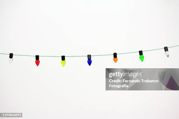 colored light bulbs - snöre bildbanksfoton och bilder