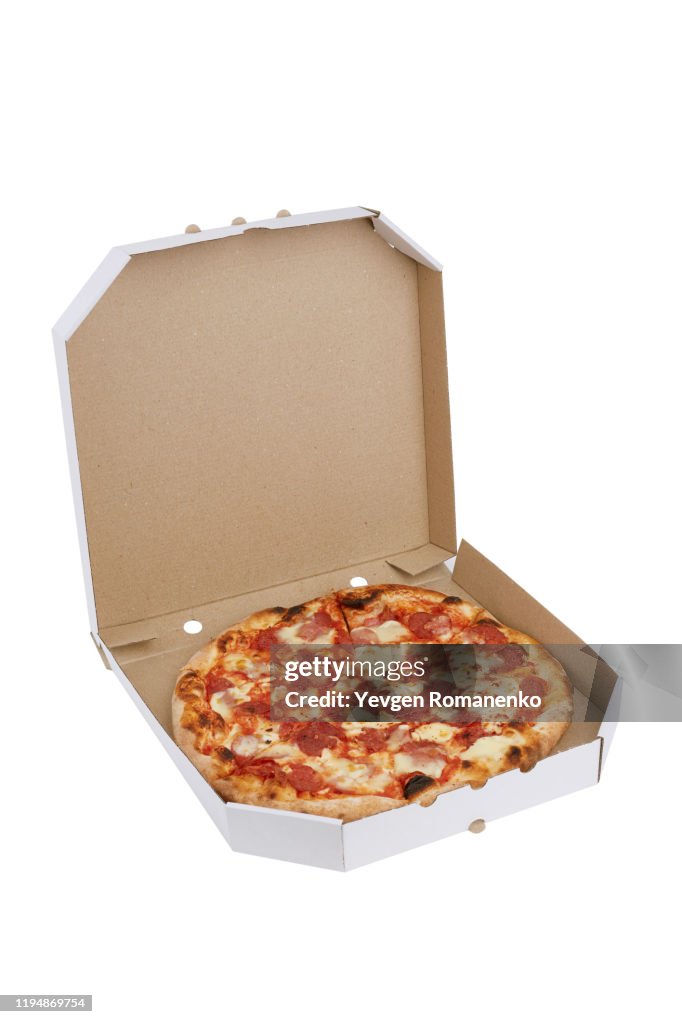 Pepperoni pizza in a box on a white background