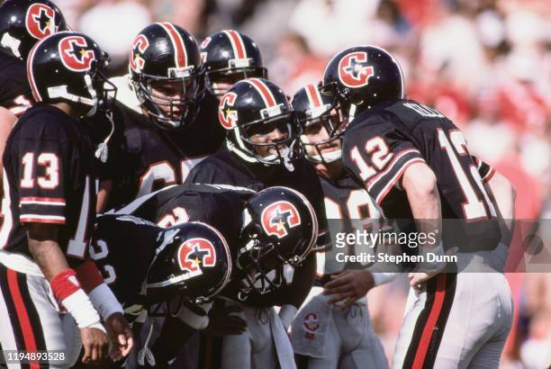 Jim Kelly#12, Quarterback for the Houston Gamblers talks to his offensive line during the USFL United States Football League Western Conference game...