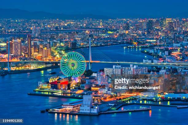 cityscape of osaka bay - osaka prefecture stock pictures, royalty-free photos & images