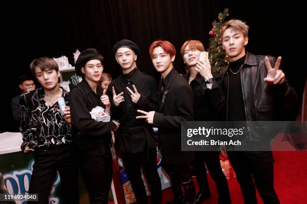 Minhyuk, Hyungwon, Kihyun, Jooheon, Shownu and I.M of Monsta X visit the dippin'dots booth at the iHeartRadio's Z100 Jingle Ball 2019 Presented By...