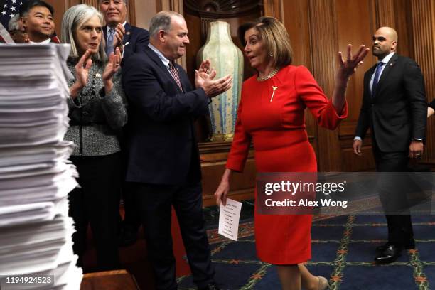 Speaker of the House Rep. Nancy Pelosi arrives at an event as Rep. Ted Lieu , Rep. Katherine Clark , Rep. Mark Takano , Rep. Dan Kildee and Rep....