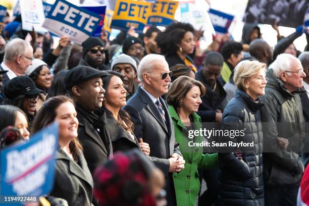 Democratic presidential candidates, Rep. Tulsi Gabbard , left, former Vice President Joe Biden, Sen. Amy Klobuchar , Sen. Elizabeth Warren , and Sen....