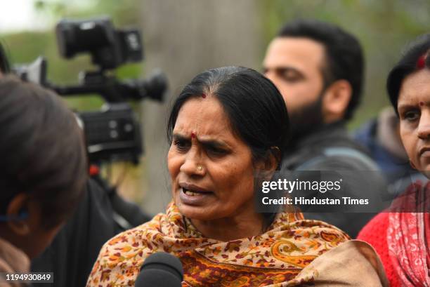 Mother of December 2012 gang rape victim Asha Devi speaks to the media after a hearing, at Supreme Court on January 20, 2020 in New Delhi, India. The...