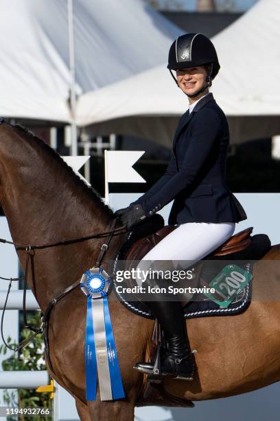 Jennifer Gates comes in first place during the $15,000 High A/O 1.45M Jumper Classic sponsored by Lugano Diamonds at the Winter Equestrian Festival...