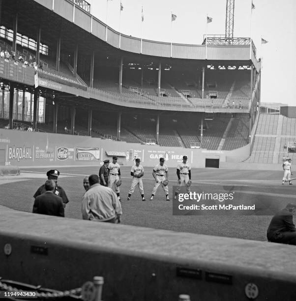 Members of the San Francisco Giants baseball team warm up at the Polo Grounds prior to a game against the New York Mets, New York, New York, June 2,...