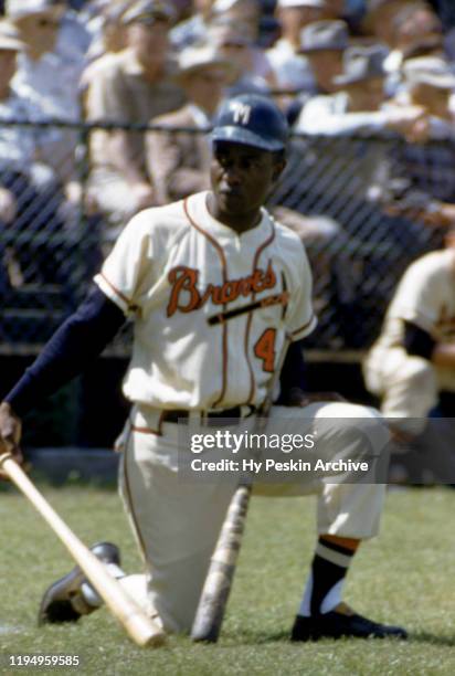 Hank Aaron of the Milwaukee Braves waits on on-deck during an MLB Spring Training game against the New York Yankees circa March, 1958 in Bradenton,...