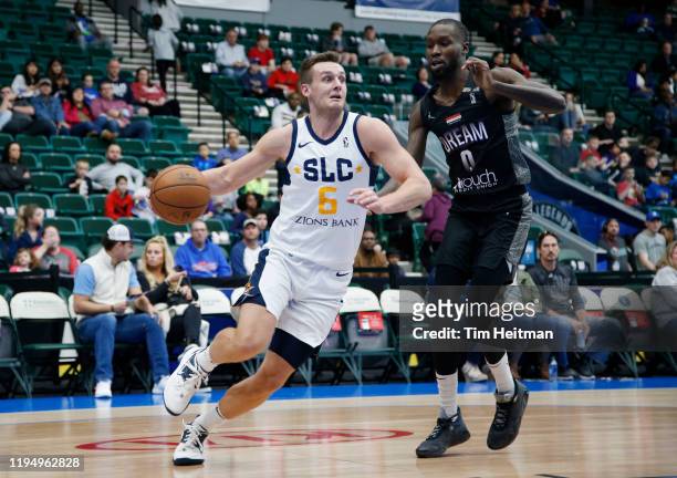 Kyle Collinsworth of the Salt Lake City Stars drives on Trahson Burrell of the Texas Legends during the second quarter on January 20, 2020 at...
