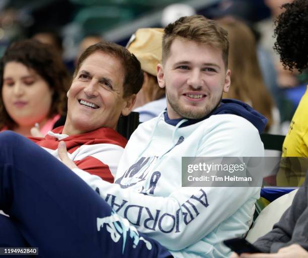 Mark Cuban owner of the Dallas Mavericks and Luka Doni of the Dallas Mavericks watch the game between the Texas Legends and the Salt Lake City Stars...