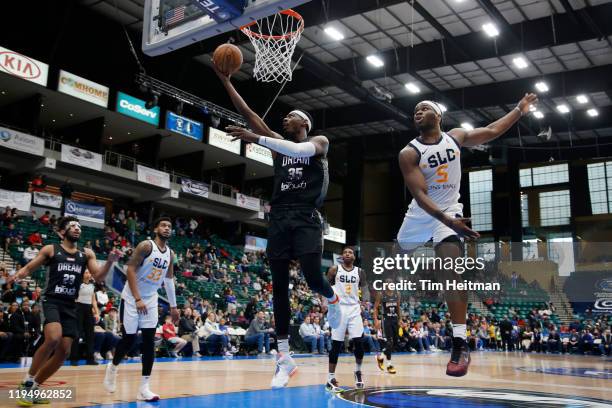 Aric Holman of the Texas Legends drives on Jarrell Brantley of the Salt Lake City Stars during the third quarter on January 20, 2020 at Comerica...