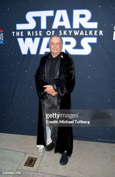 Todd Fisher, brother of the late actress Carrie Fisher, poses at the IMAX opening of "Star Wars: The Rise Of Skywalker" at TCL Chinese Theatre on...