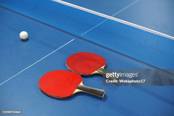 two table tennis bat and ball - table tennis bat stock pictures, royalty-free photos & images