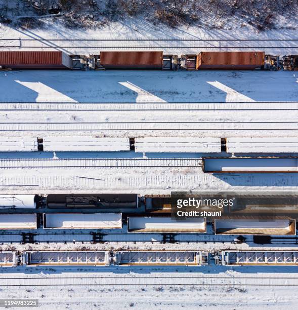 fresh snow on railyard - boxcar stock pictures, royalty-free photos & images