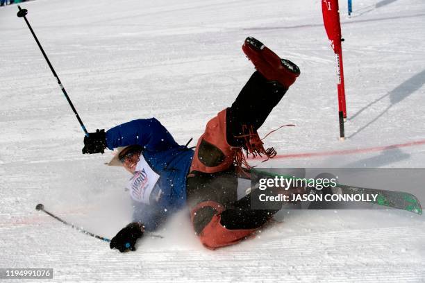 Meiers, a professional saddle bronco rider from Mills, Wyoming, crashes during the 46th Annual Cowboy Downhill on January 20, 2020 at Steamboat Ski...