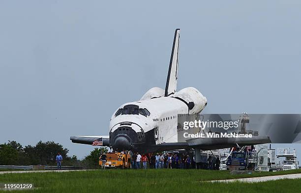 Space Shuttle Atlantis is towed at Kennedy Space Center July 21, 2011 in Cape Canaveral, Florida. Atlantis was the final shuttle mission for NASA,...