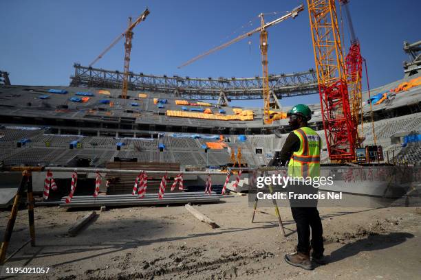 Worker is seen inside the stadium during a stadium tour at Lusail Stadium on December 20, 2019 in Doha, Qatar.