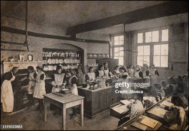 antique london's photographs: cooking class - 1900s woman stock illustrations