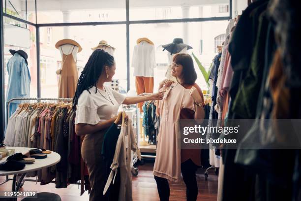 this dress is a steal at this price - outlet store stock pictures, royalty-free photos & images