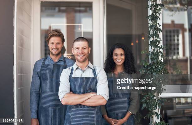 we add a smile to every service - three people working together stock pictures, royalty-free photos & images