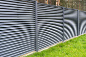 blank metal fence in the village