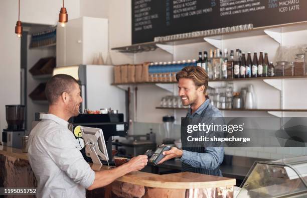 processing payments with so much ease - payment processing stock pictures, royalty-free photos & images