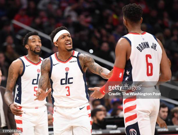Washington Wizards guard Bradley Beal calms down Troy Brown Jr. During action against the Detroit Pistons at Capital One Arena.