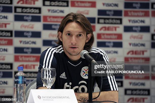 Paraguay's national football team player Edgar Barreto gives a press conference in Mendoza, Argentina on July 21, 2011. Paraguay defeated Venezuela...