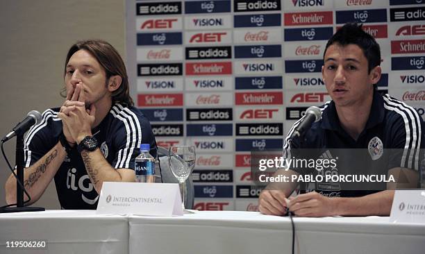 Paraguay's national football team players Edgar Barreto and Ivan Piris give a press conference in Mendoza, Argentina on July 21, 2011. Paraguay...