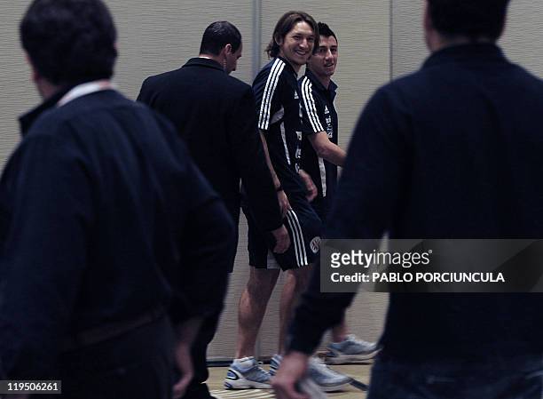 Paraguay's national football team players Edgar Barreto and Ivan Piris leave a press conference in Mendoza, Argentina on July 21, 2011. Paraguay...