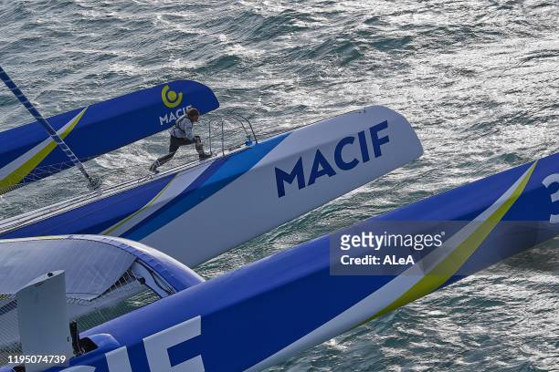 Maxi trimaran skippers Francois Gabart and Gwenole Gahinet are sailing in strong wind conditions during a trainning session prior to the Brest...