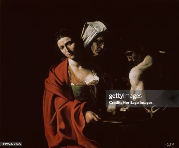 Salome with the head of John the Baptist, ca 1607. Found in the Collection of Patrimonio Nacional, Madrid. Artist Caravaggio, Michelangelo .