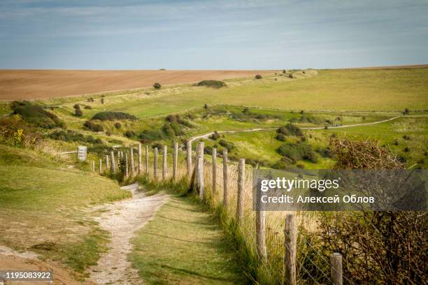 path along the field at dover's hill near chipping campden - kent england stock pictures, royalty-free photos & images