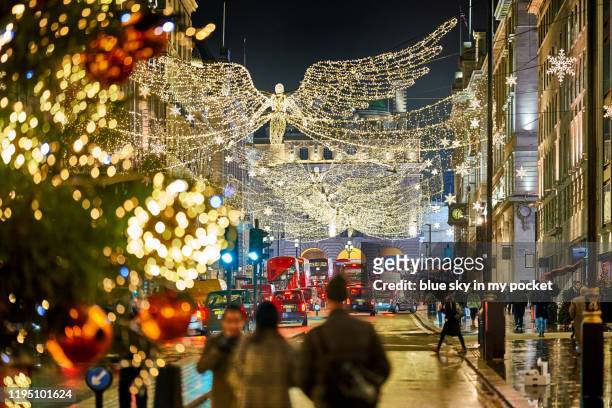 london christmas lights on lower regents street - regent street christmas lights stock pictures, royalty-free photos & images