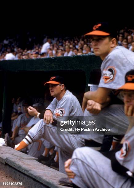 Manager Paul Richards of the Baltimore Orioles looks on from the dugout during an MLB game against the Detroit Tigers on June 28, 1959 at Briggs...