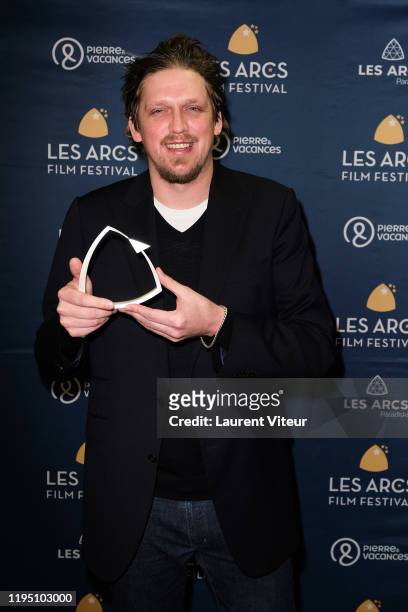 Director Jan-Ole Gerster receives Best Film Press Award during the Closing ceremony during the Les Arcs International Film Festival - Day Seven on...