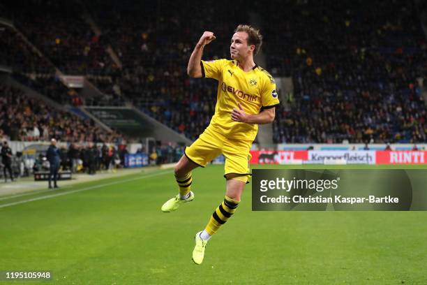 Mario Gotze of Borussia Dortmund celebrates scoring the first goal during the Bundesliga match between TSG 1899 Hoffenheim and Borussia Dortmund at...