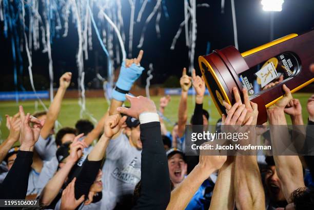 Tufts Jumbos players celebrate their win against the Amherst Mammoths during the Division III Men's Soccer Championship held at UNCG Soccer Stadium...