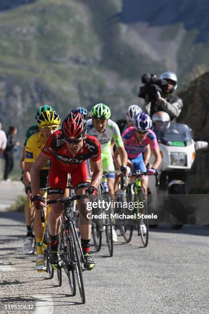 Cadel Evans of Australia and BMC Racing Team leads the chasing bunch ahead of yellow jersey leader Thomas Voeckler of France and Team Europcar on the...