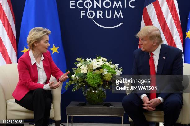 President Donald Trump speaks with European Commission President Ursula von der Leyen prior to their meeting at the World Economic Forum in Davos, on...