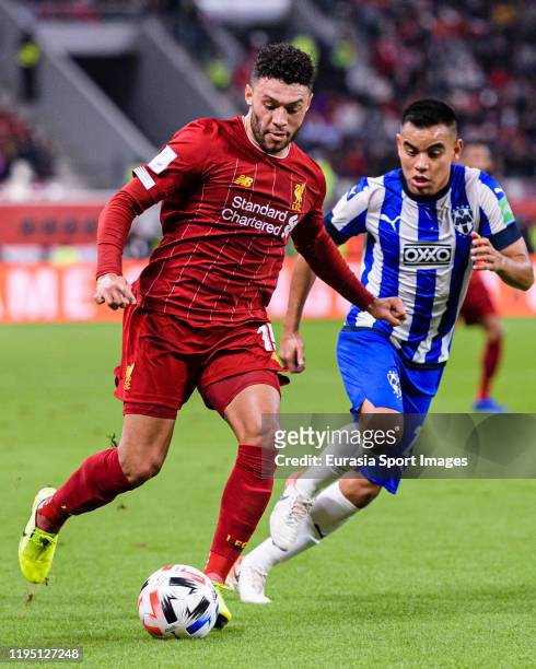 Alex Oxlade-Chamberlain of Liverpool plays against Carlos Rodriguez of Monterrey during FIFA Club World Cup Semi-Final match between Monterrey and...