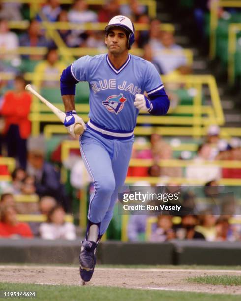 Damaso Garcia of the Toronto Blue Jays bats during an MLB game versus the Chicago White Sox during the 1986 season at Comiskey Park in Chicago,...
