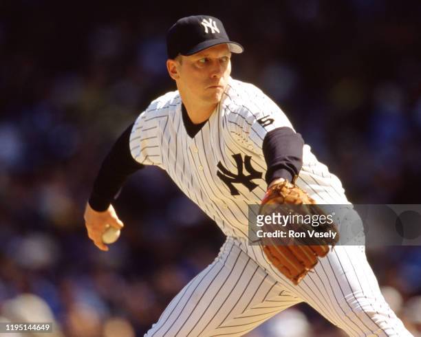 David Cone of the New York Yankees pitches during an MLB game at Yankee Stadium during the 1998 season.