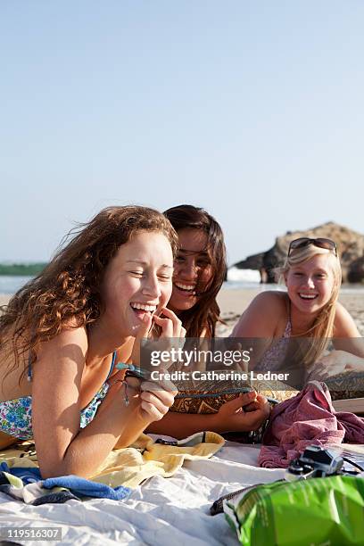 teenage girls having fun at the beach - la beach stock pictures, royalty-free photos & images