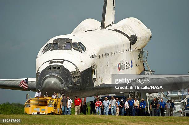 In this handout image provided by the National Aeronautics and Space Administration , space shuttle Atlantis is rolled over to the Obiter Processing...