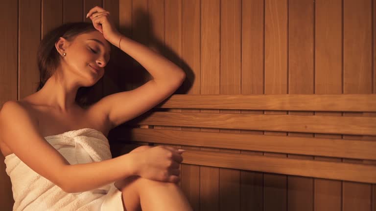https://media.gettyimages.com/id/1195190069/video/female-seating-in-wooden-bench-indoor-sauna-room.jpg?b=1&s=640x640&k=20&c=POAkXCCWkF5zUtE9ch2Vd3fQRNxRHJfH8r5Y560jajs=