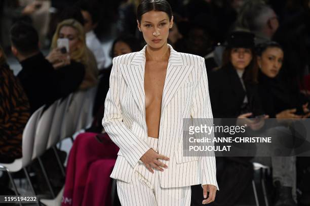 Model Bella Hadid presents a creation by Alexandre Vauthier during the Women's Spring-Summer 2020/2021 Haute Couture collection fashion show in...