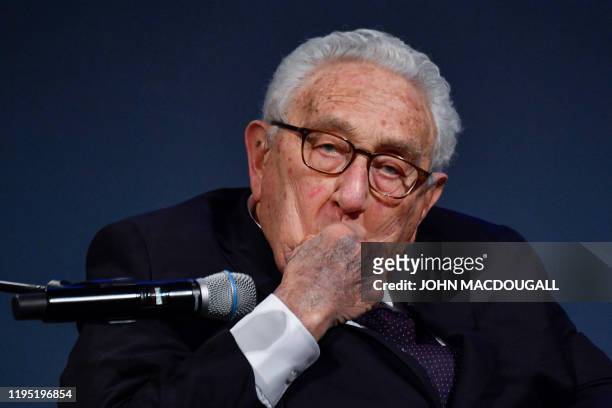 Former US Secretary of State Henry Kissinger attends the awarding ceremony where German Chancellor Angela Merkel received the "Henry A Kissinger...