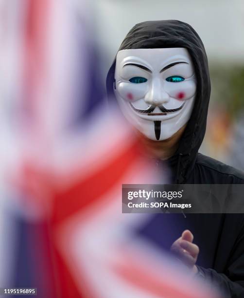 Pro-democrats protester wearing a Guy Fawkes mask during the assembly. The Hong Kong Civil Assembly Team organised a Sunday Assembly to make...