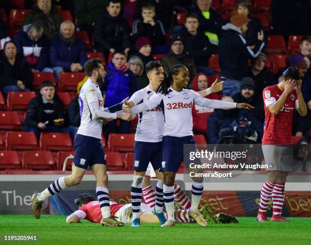 Preston North End's Daniel Johnson celebrates scoring his side's second goal with team-mates during the Sky Bet Championship match between Barnsley...